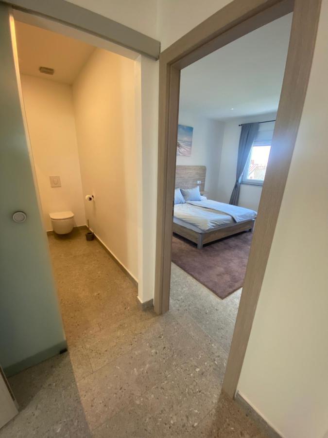 Apartmani Kumenat บีโอกราดนาโมรู ภายนอก รูปภาพ